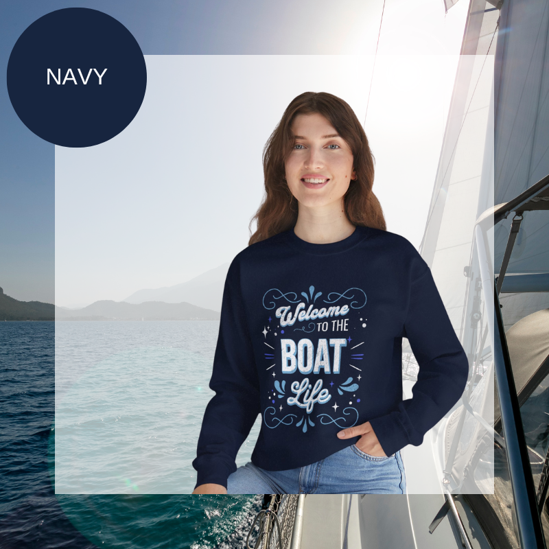 Navy blue women's sweatshirt with the text "Welcome to the Boat Life" in a decorative nautical design, perfect for sailing enthusiasts and boat lovers.