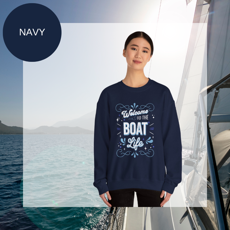 Navy blue women's sweatshirt with the text "Welcome to the Boat Life" in a decorative nautical design, perfect for sailing enthusiasts and boat lovers.