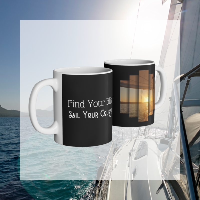 Elegant black coffee mug featuring the motivational text 'Find Your Bliss, Sail Your Course' alongside a serene sunset sailing scene, perfect for adventurers and dreamers.