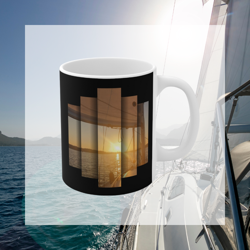 Elegant black coffee mug featuring the motivational text 'Find Your Bliss, Sail Your Course' alongside a serene sunset sailing scene, perfect for adventurers and dreamers.