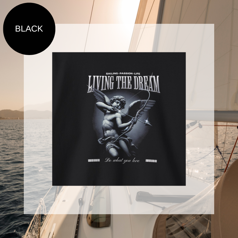 Black women's sweatshirt with 'Living the Dream' nautical-themed print, featuring an artistic sailor-inspired design, perfect for sailing enthusiasts.
