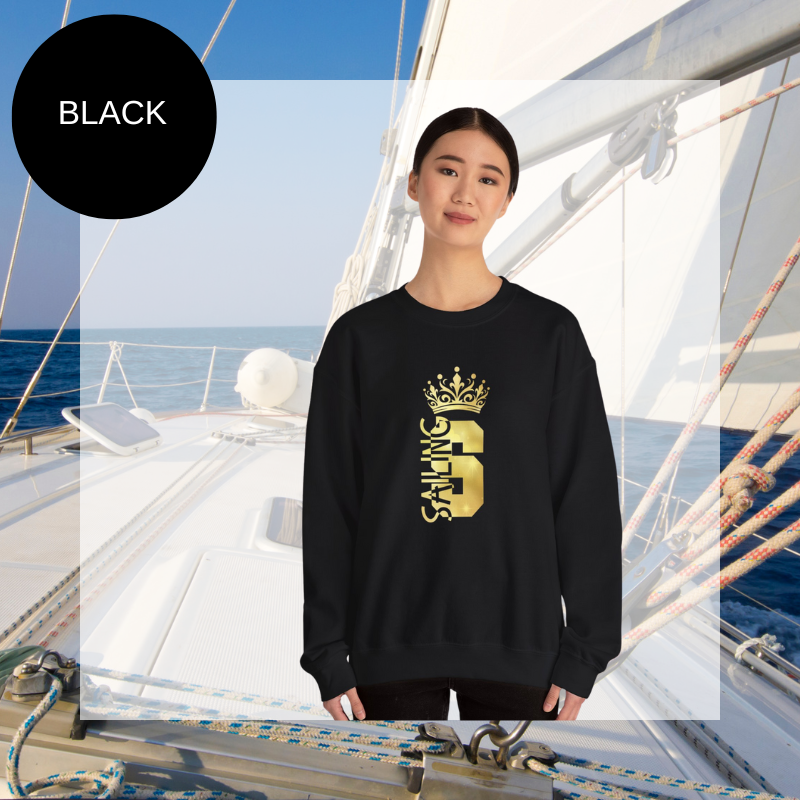 Women's black sweatshirt with a golden 'Sailing Queen' design featuring a crown, perfect for sailing enthusiasts and casual wear.