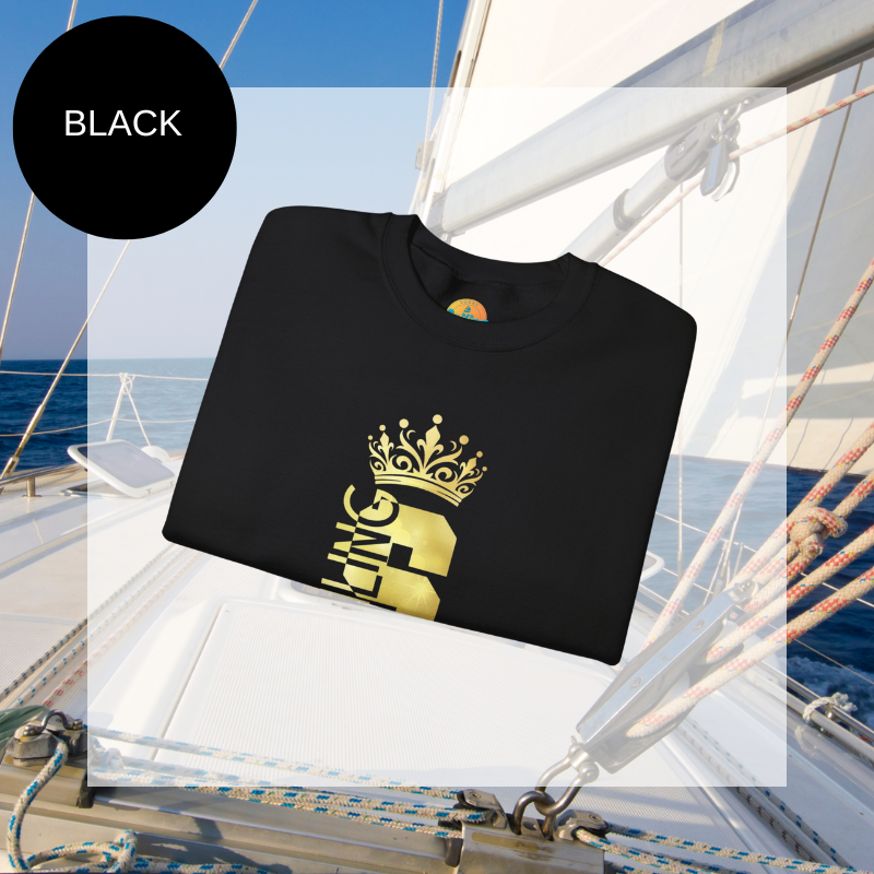 Women's black sweatshirt with a golden 'Sailing Queen' design featuring a crown, perfect for sailing enthusiasts and casual wear.