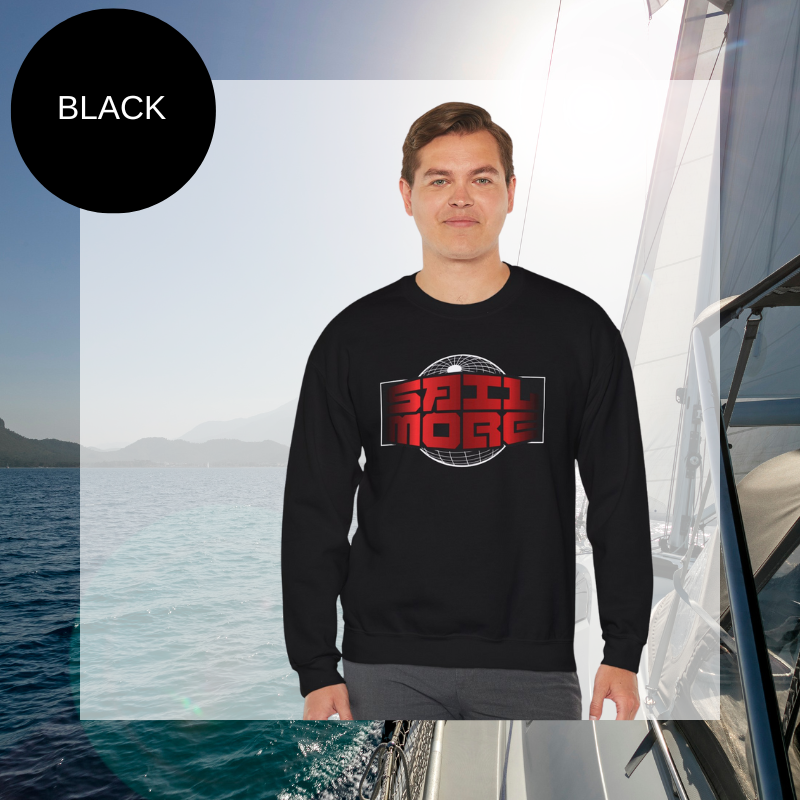 Men's black sweatshirt with a bold red and white 'Sail More' print featuring a globe-inspired design, perfect for sailing enthusiasts.