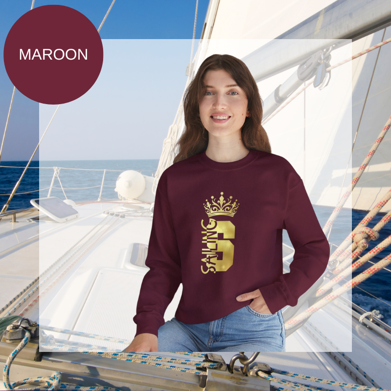 Women's maroon red sweatshirt with a golden 'Sailing Queen' design featuring a crown, perfect for sailing enthusiasts and casual wear.