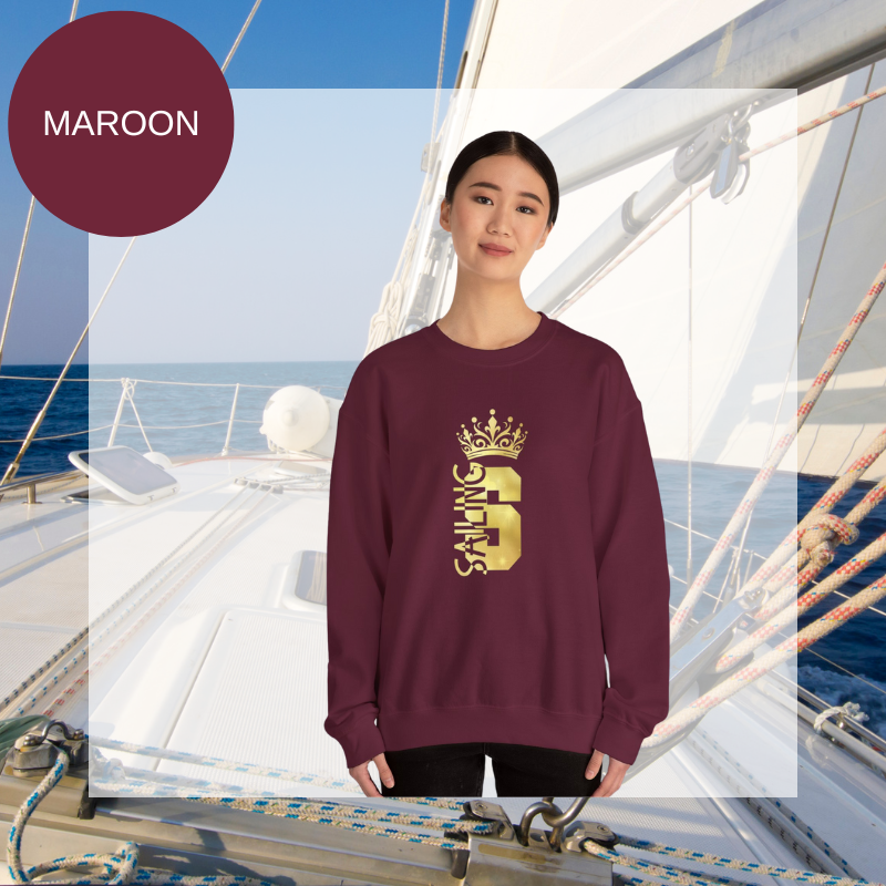 Women's maroon red sweatshirt with a golden 'Sailing Queen' design featuring a crown, perfect for sailing enthusiasts and casual wear.