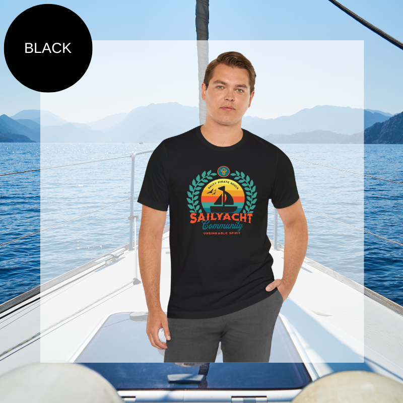 Black unisex t-shirt featuring a vibrant 'Sailyacht Community' design with a sailboat, laurel wreath, and retro sunset, displayed on a yacht deck background.