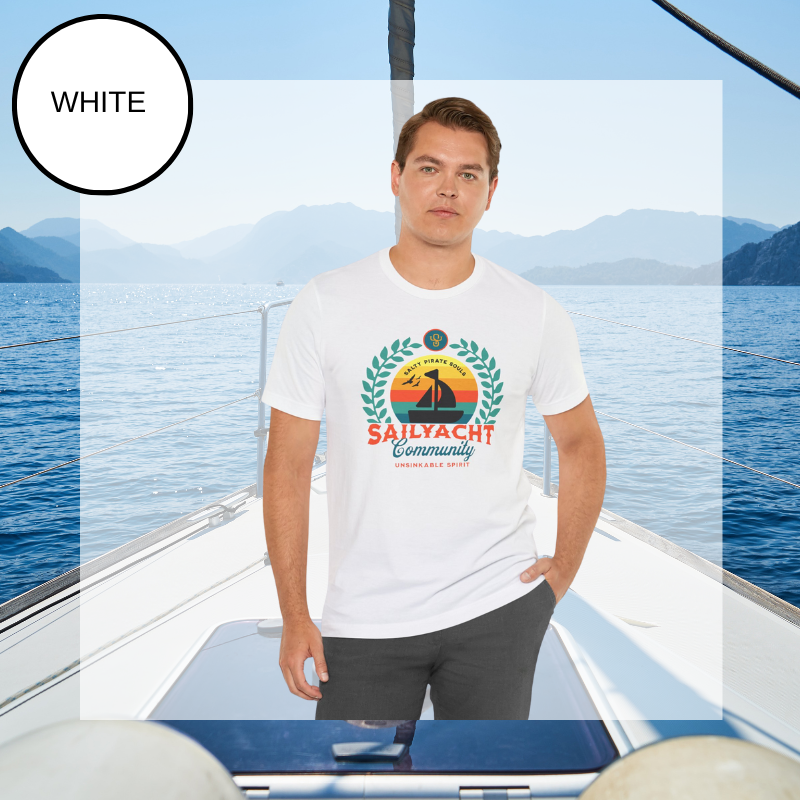 White unisex t-shirt featuring a vibrant 'Sailyacht Community' design with a sailboat, laurel wreath, and retro sunset, displayed on a yacht deck background.