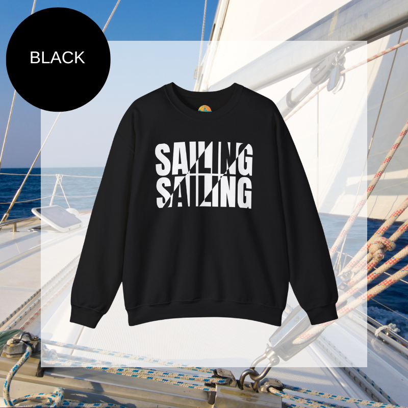 A black men's sweatshirt with a bold white "SAILING" split text design, displayed against a sailing yacht background.