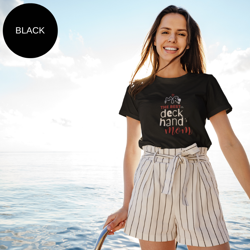 Black t-shirt featuring a playful design with outlined illustrations of a dog and a cat, accompanied by the text 'The Best Deckhand's Mom' in white and red fonts, perfect for pet-loving sailors.
