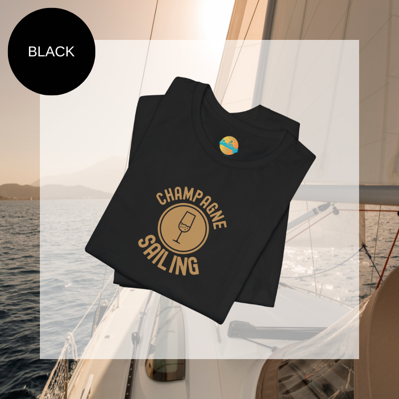Black t-shirt featuring a minimalist design with the text 'Champagne Sailing' in elegant gold lettering and a simple champagne glass icon, perfect for lovers of luxurious sailing vibes.