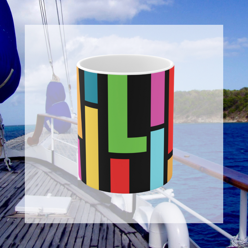 Colorful coffee mug with a bold, artistic 'SAILING' typography design, perfect for adding a vibrant nautical touch to your morning routine or gifting to sailing enthusiasts.
