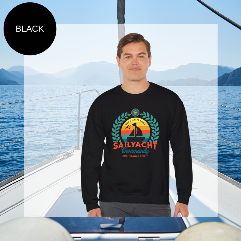 A black men's sweatshirt featuring a colorful nautical design with the text "Sailyacht Community" and "Salty Pirate Souls Unsinkable Spirit," displayed on a sailboat background.