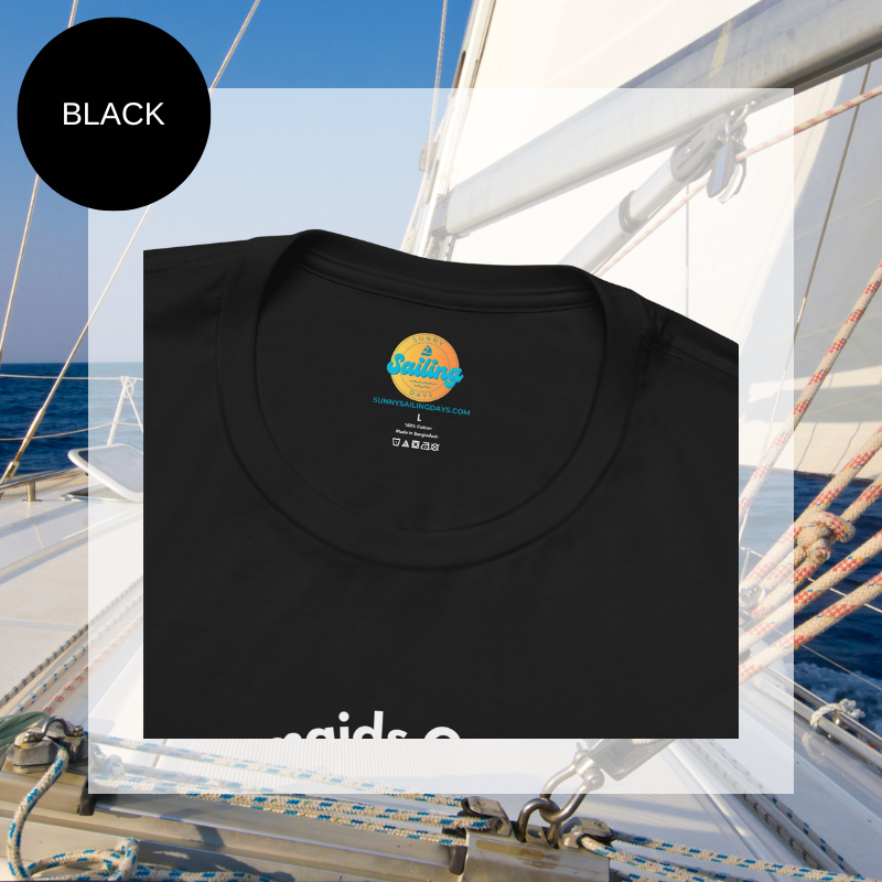 Black unisex t-shirt featuring a whimsical mermaid design with the text 'Where Mermaids Guide the Way, Sailors Find Their Haven,' displayed on a yacht deck background.