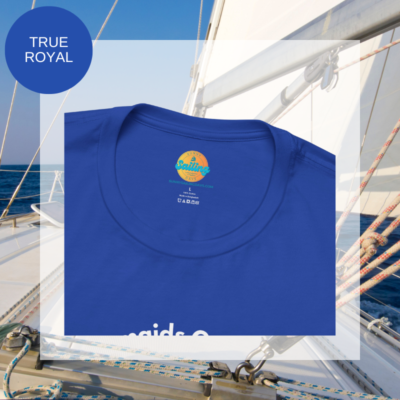 Royal blue unisex t-shirt featuring a whimsical mermaid design with the text 'Where Mermaids Guide the Way, Sailors Find Their Haven,' displayed on a yacht deck background.