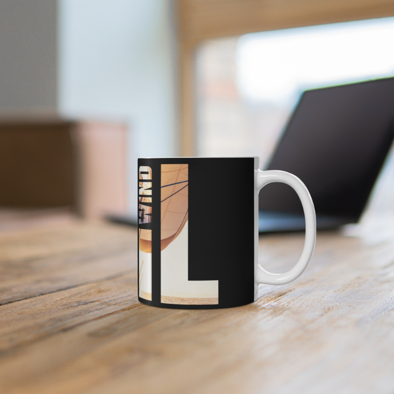Black coffee mug with bold typography spelling 'SAIL OCEAN WIND,' featuring a vibrant image of a sailboat bathed in warm sunlight, perfect for sailing enthusiasts.
