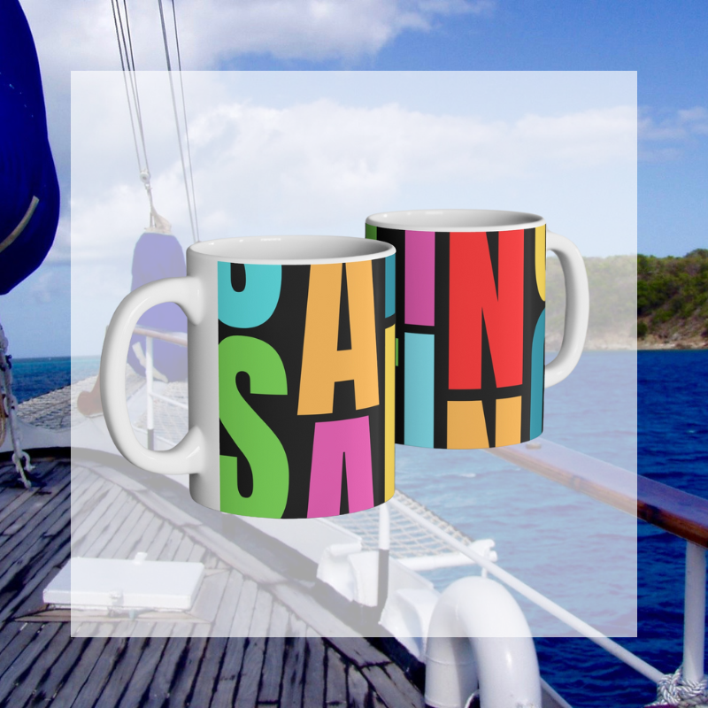 Colorful coffee mug with a bold, artistic 'SAILING' typography design, perfect for adding a vibrant nautical touch to your morning routine or gifting to sailing enthusiasts.