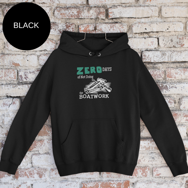 Black hoodie featuring the humorous sailing-themed text 'ZERO DAYS of Not Doing the BOATWORK,' ideal for passionate boaters who embrace the never-ending tasks of boat maintenance.