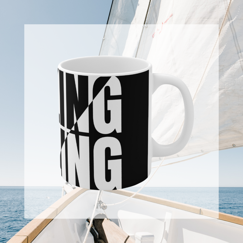 Modern sailing-themed coffee mug with bold black and white typography reading 'SAILING,' perfect for nautical enthusiasts and coffee lovers alike.