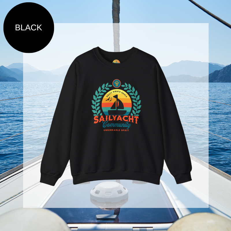 A black men's sweatshirt featuring a colorful nautical design with the text "Sailyacht Community" and "Salty Pirate Souls Unsinkable Spirit," displayed on a sailboat background.
