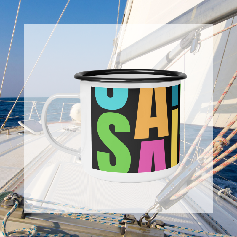 Colorful enamel mug with bold, vibrant 'SAILING' text design in a modern block font, perfect for nautical enthusiasts and lovers of bright, eye-catching patterns, captured against a serene sailing backdrop.