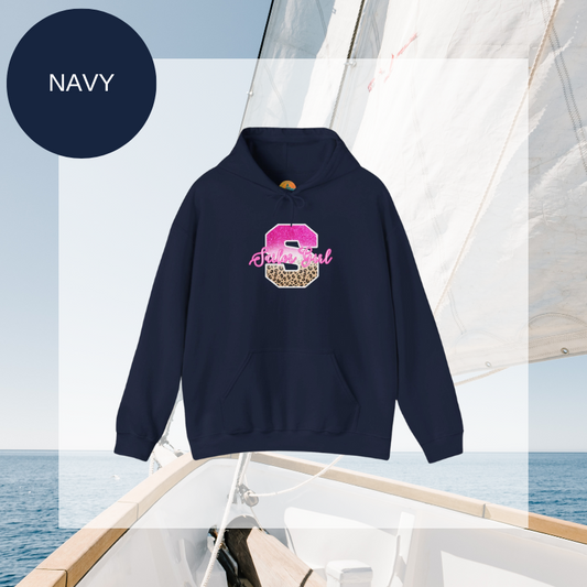 Dark navy hoodie featuring a bold 'S' design with pink glitter and leopard print accents, along with the text 'Sailor Girl' in an elegant script font, perfect for nautical enthusiasts with a chic style.
