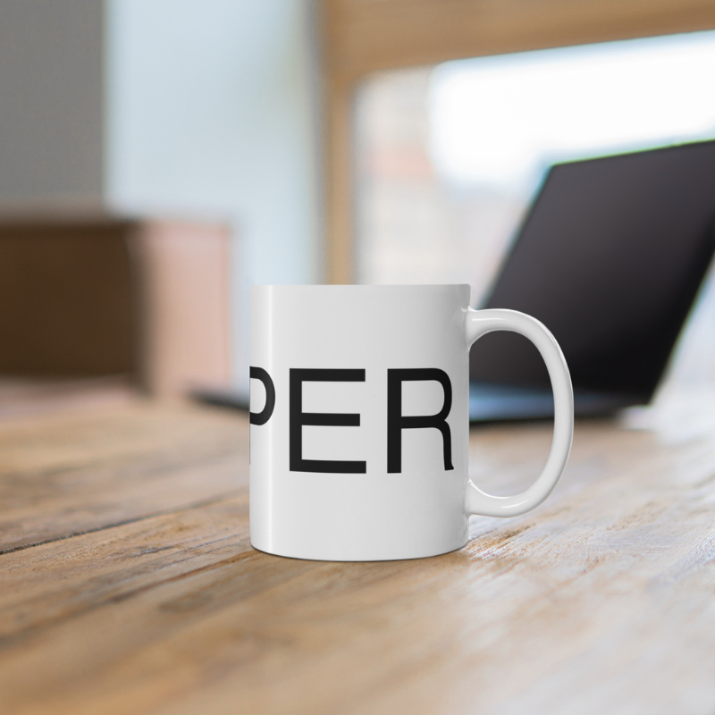 Minimalistic white coffee mug featuring bold black text that reads 'SKIPPER,' perfect for sailors and nautical enthusiasts