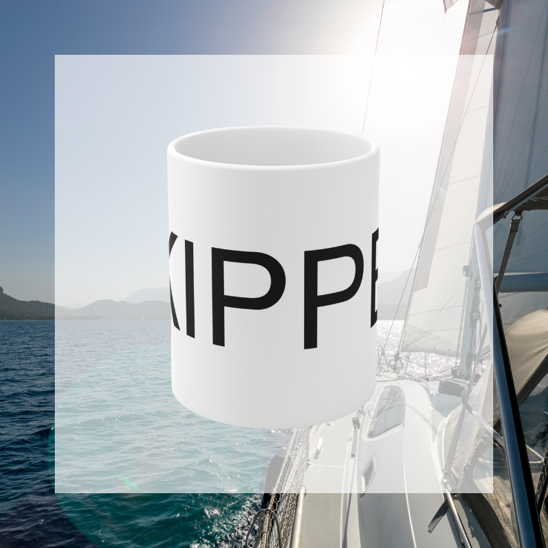 Minimalistic white coffee mug featuring bold black text that reads 'SKIPPER,' perfect for sailors and nautical enthusiasts