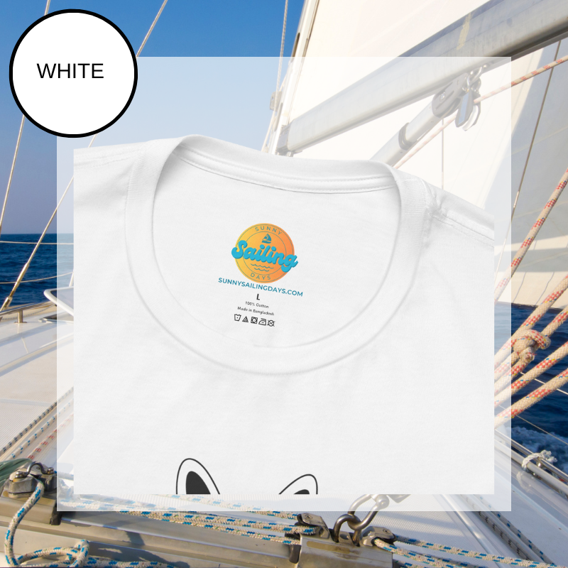 White t-shirt featuring the text 'Best Salty Dog Dad Ever' in playful fonts. The design includes an illustration of a cute dog's face peeking over the words, combining nautical and pet-loving themes. The background showcases a serene sailing scene with ropes and a yacht deck.