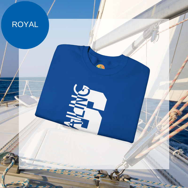 Black sweatshirt featuring a bold vertical 'S' with the word 'SAILING' integrated into the design, displayed on a sailboat deck with ocean and sky in the background.
